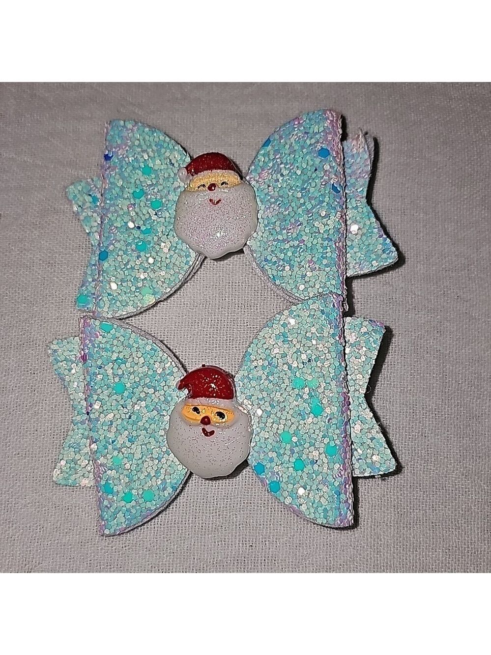 Pair of cute santa iridescent hair bows